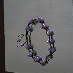 Handmade sparkling purple bracket with brown chord adjustable